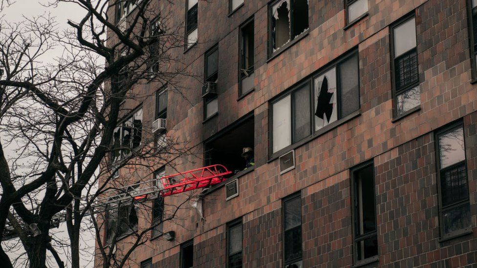 An image of the NYC apartment building post fire