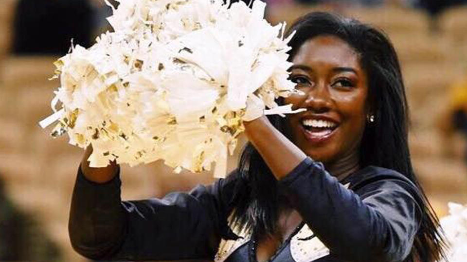 Camille Sturdivant dances with pompoms