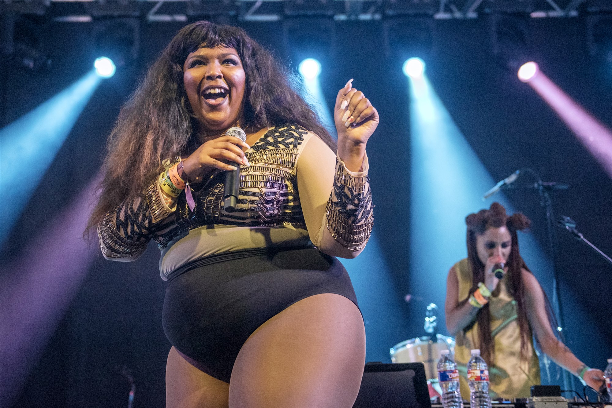 Lizzo performs on stage.